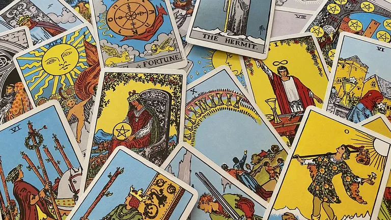 A pile of tarot cards from the Rider-Waite Tarot Deck